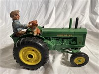 John Deere model AR with rider and dog
