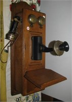 Antique oak Stromberg Carlson wall phone.