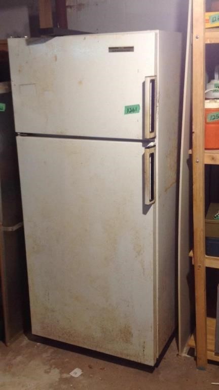 Kelvinator refrigerator, in basement bring help