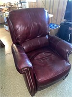 Burgundy leather recliner by Hancock and Moore