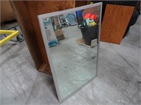 Mirror with metal frame