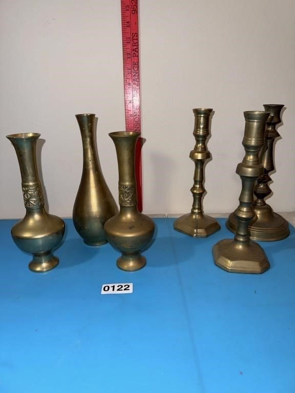 Brass candlestick holders and vases