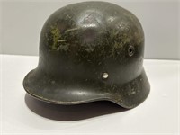 M40 WWII German rolled rim helmet with liner inch