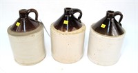 3- Stoneware jugs, approximately 1 gallon each