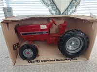 Ertl International row crop tractor with box