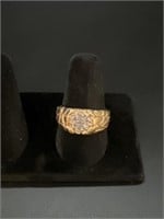 Unmarked Gold Ring with 7 Diamonds, 5.9 Grams