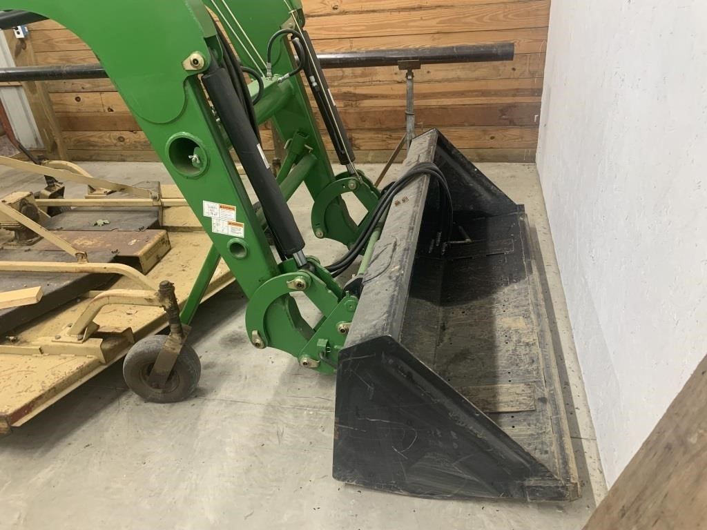 Front end loader for tractor plus skid steer