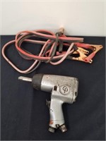 Central pneumatic impact wrench and a pair of