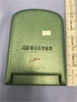 A vintage metal, "Addiator" calculator, can also "