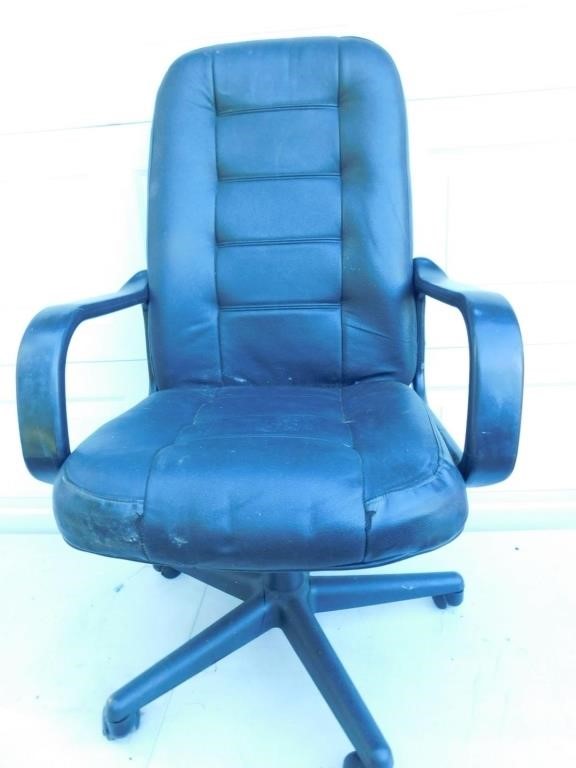 High back desk chair with arm rests.