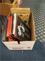 Box of 45 and 78 rpm show tunes, some