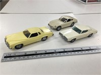 3 plastic cars