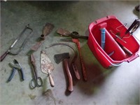 Hand tools in plastic bucket