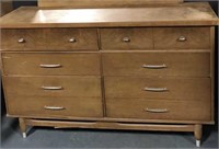 Medium wood toned mid century chest of drawers