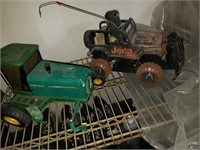 John Deere green tractor Is missing  A tire,