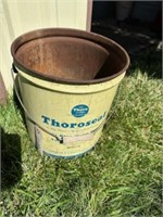 Old metal bucket w/ advertisement