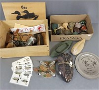 Group of duck and sporting related items including