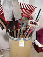 Shovels, rakes, garden tools, barrel