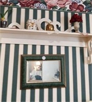 Shelf contents and mirror