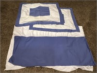 Blue bed skirt, and two pillow shams