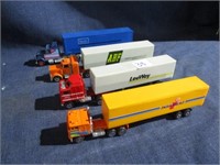 Die cast trucks and trailers .