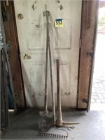 Pick ax shovel and yard rake