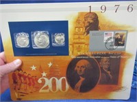 1976-S uncirculated mint coin-stamp set (silver?)