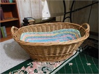 Wicker laundry basket with crocheted cloth liner,