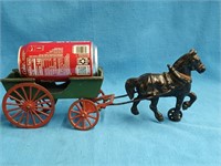 Cast Iron horse and wagon look at pictures,