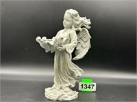 9" resin statue wind blown angel holding flower