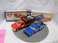 Pair of Mobil Oil L.E. toy trucks: 1 is a