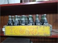 Vintage Coca Cola crate with bottles