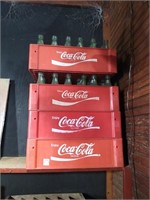 Coca Cola crates with bottles