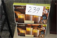 2 NIB 3 PIECE CANDLE SETS WITH REMOTE?