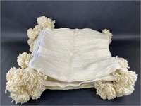 Twelve Cream Pillow Cases with Pompoms