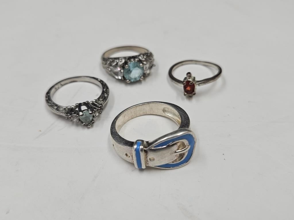 4 Various Size Rings Marked   925 Silver
