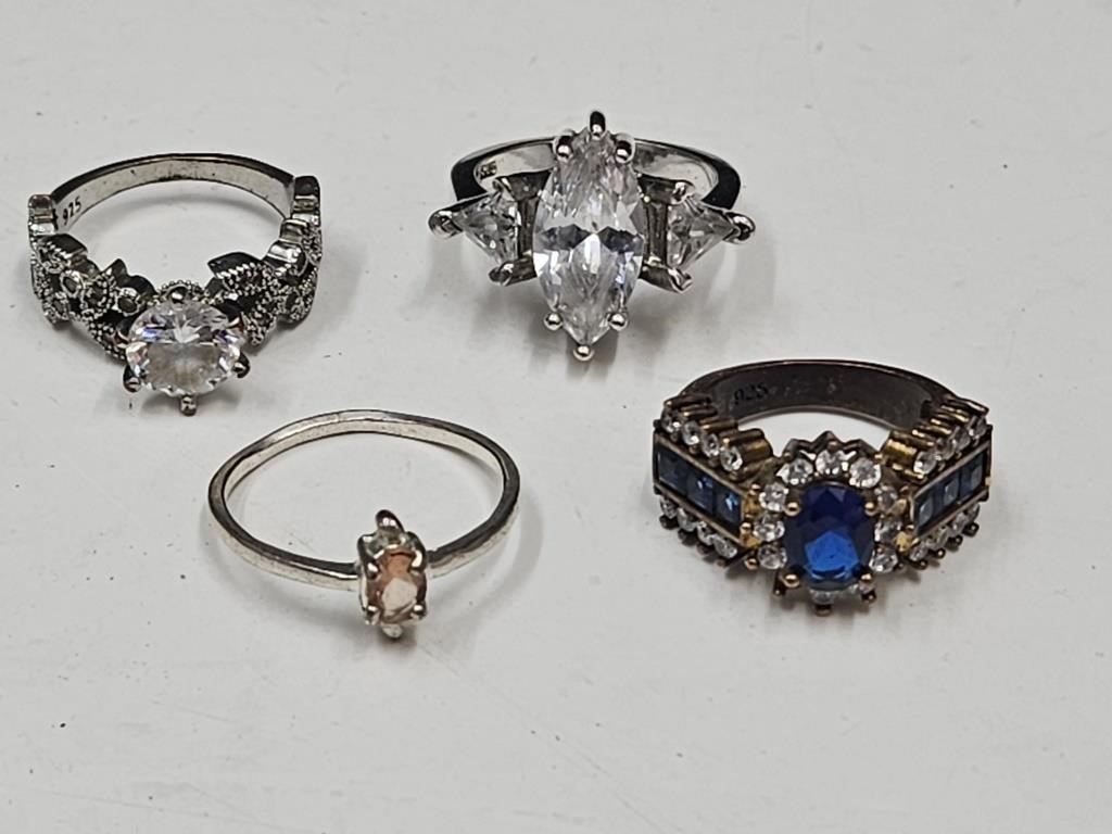 4 Various Size Rings  Marked  925 Silver