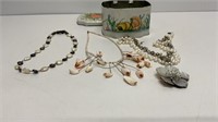 (2) pearl-like necklaces and beaded necklace with