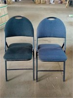 Two Dark Grey Fabric Padded Folding Chairs