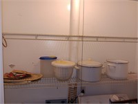 Contents of shelf in laundry room pots, placemats