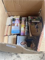 Box of paperback books