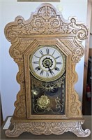 Pendulum Table Clock Framed in Carved Oak