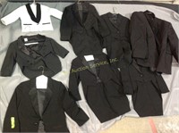Black and white tuxedo jacket, some with tails,