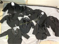 Black tuxedo jackets, some with tails, children's