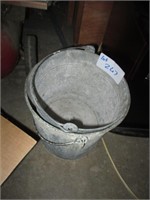 2 vintage metal buckets