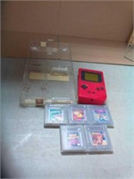 Nintendo game boy with case and 5 games.