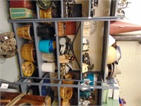 shelf of telephones, clocks