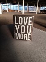 Love you more sign