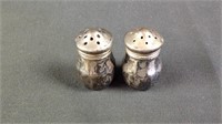 Pair of small salt pepper shakers sterling silver