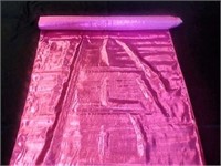 Roll of Bright Pink Metallic fabric